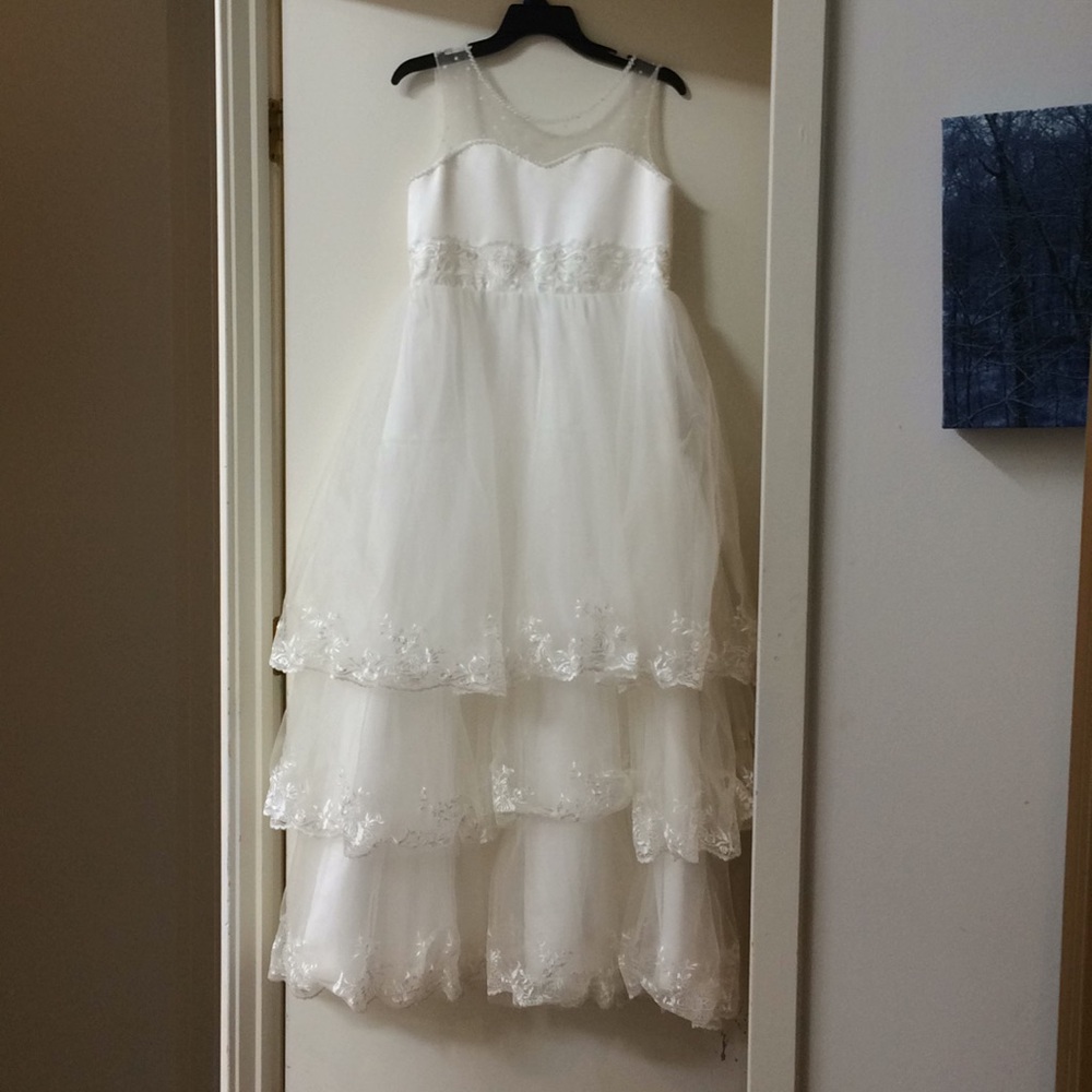 Lovely white lace tiered gown